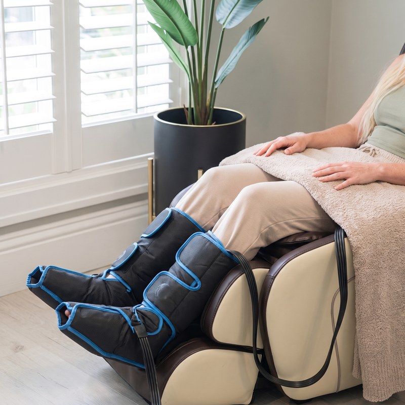 A guest relaxing in air compression boots